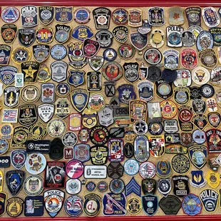 a large collection of badges