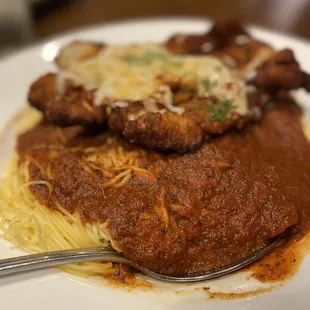 Chicken Parmigiana with Angel hair noodles (extra order of noodles)
