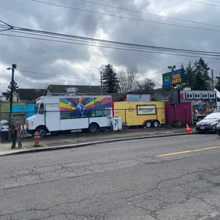 a food truck parked on the side of the road