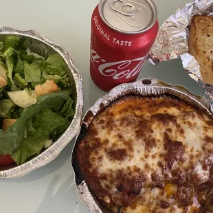 Lunch special. Lasagna, house salad, bread, soda