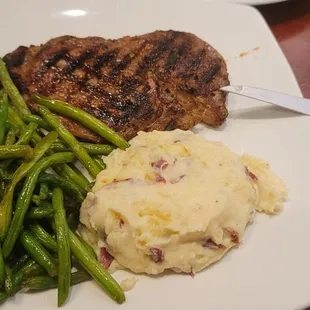 Ribeye perfectly cooked lacked seasoning, I used A1, which did the job.  Mashed potatoes very good
