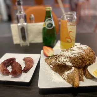Chicken and French toast, with a side of sausage.