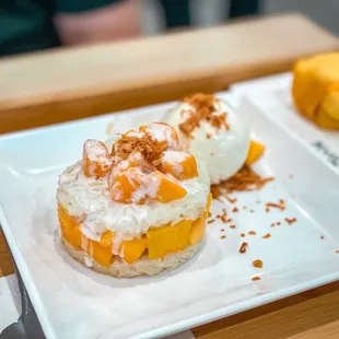 Mango sticky rice and ice cream with toasted coconut.