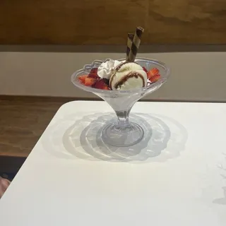 I02. Vanilla Strawberry Sundae with Chocolate Syrup