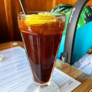 a drink in a glass with a straw