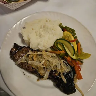 Butter garlic NY strip steak, mash potatoes and hot veggies