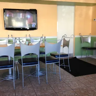 dining area with flat screen tv