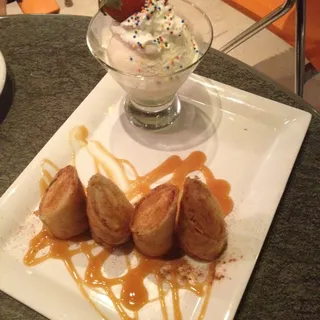 Cinnamon Sugar Banana Spring Rolls with Vanilla Ice Cream.