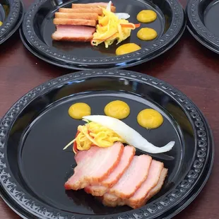 Smoked pork with chili mango glaze and pickled Maui onions