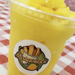 a smoothie in a plastic cup