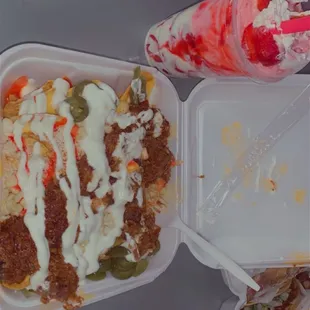 Tostielote with birria and sour cream.