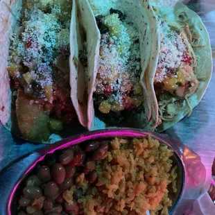 Trio tacos bo flavor was off the hook beans rice with red bell pepper so good