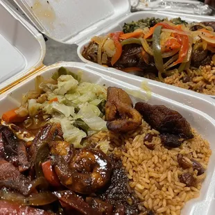 Brown stew shrimp, Rice &amp; Peas &amp; cabbage (left) Red Snapper w/escovitch, rice and peas &amp; callaloo (right)