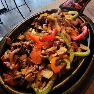 Steak fajitas it comes with a side of rice and beans