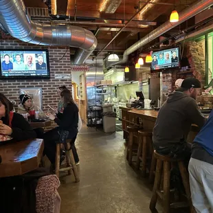 people sitting at the bar