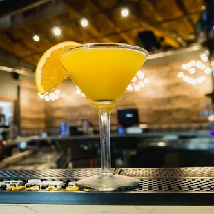 a cocktail in a martini glass