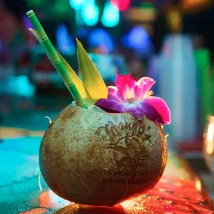 a drink in a coconut