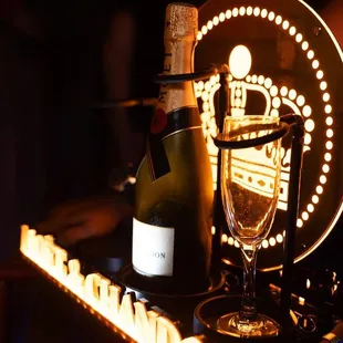 a glass of wine and a bottle
