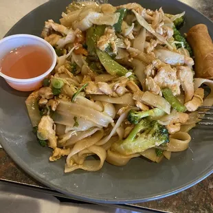 19. Pad Kee Mao with a spring roll.