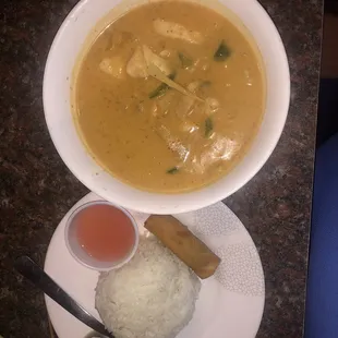 Yellow curry with chicken and vegetables.