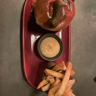 Jerk chicken sandwich and Fries  Pass the Duchie