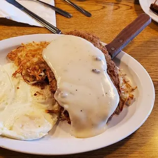 Chicken Fried Steak w/ Country Gravy, Hash Brown and Eggs Over Easy