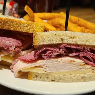 a roast beef sandwich and french fries