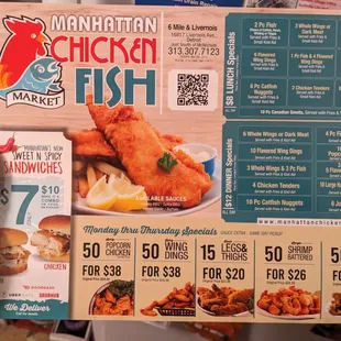 a hand holding a menu
