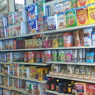 shelves of food and drinks in a grocery store