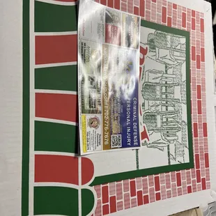 a pizza box on a table