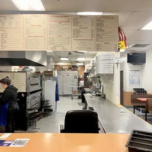 a woman working in the kitchen