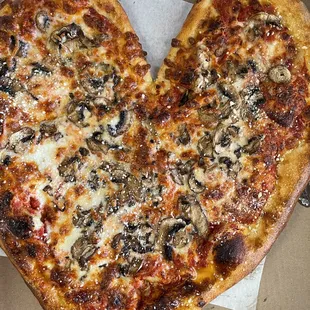 Heart-shaped valentine day, pizza