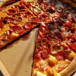 a pepperoni pizza in a box