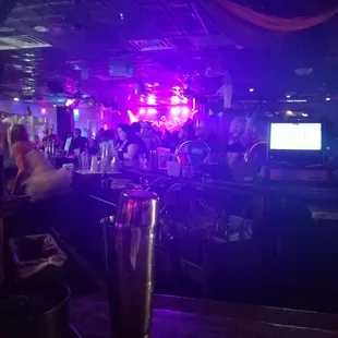 a woman sitting at the bar