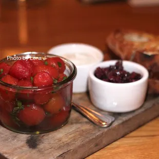 Pickled Tomatoes ($14) - whipped ricotta, tapenade, crostini