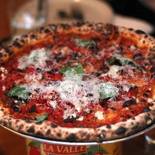 Puttanesca Pizza ($18) - Calabrian chili, oven roasted tomato, olive, red onion, parmesan