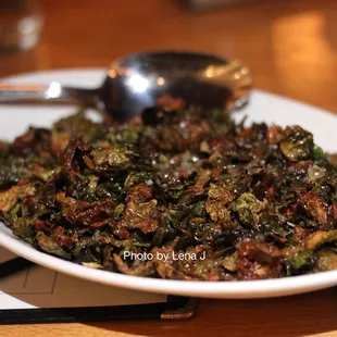 Caramelized Brussels Sprouts ($13) - maple vinaigrette, roasted garlic, toasted almond