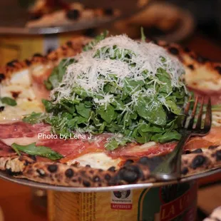 Arugula + Prosciutto Pizza ($22) - mozzarella, Ligurian olive oil, sea salt