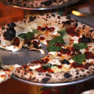 Quattro Formaggi ($20) - smoked mozzarella, provolone, ricotta, grana padano, tomato conserva, basil