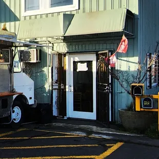 a food truck parked in front of a building