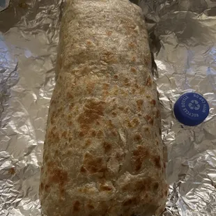 a burrito wrapped in foil
