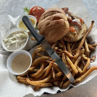 Cajun Love Burger plate with cool slaw and fries.