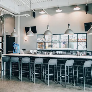 a bar with stools