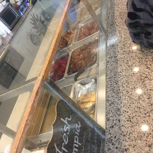 Variety of Filipino food like chicken and pork adobo, fish, mongo beans, nilaga, etc
