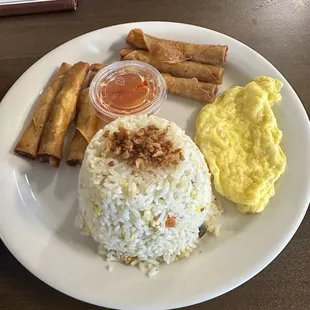 Lunch special fried rice with lumpia and I added a egg.