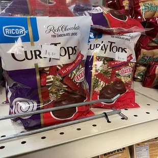 a variety of chocolates on a shelf