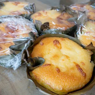 Bibingka. My fave! Like a tender, almost custardy sponge cake flecked with bits of boiled egg wrapped and cooked in banana leaves.