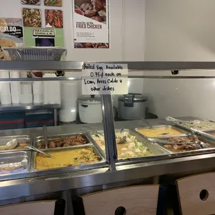 a variety of food in a buffet