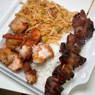 combo with pancit, lechon, and barbecue