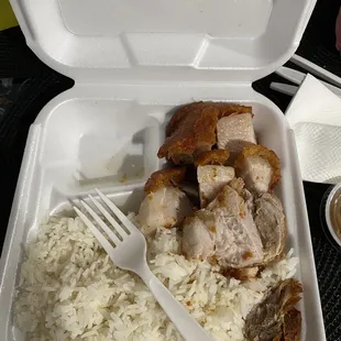 a meal in a styrofoam container